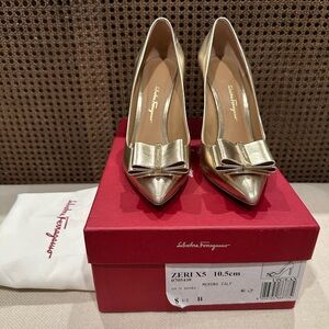 Salvatore Ferragamo Zeri X5 Bow Pumps, Gold Metallic Leather